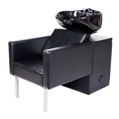 a black chair with a bowl on top of it