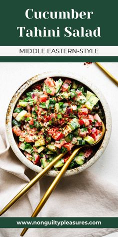 a white bowl filled with cucumber tahini salad next to two gold chopsticks