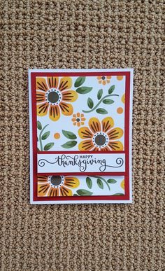 a close up of a card with flowers on it and the words, happy thanksgiving