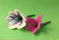 Wet Felted Flowers  They can be displayed as ornaments or you can attach pin backs to make them into brooches. They are 100% merino wool, carefully wet felted.  White: 4.5in long, Purple, 4in long Felting Flowers, Felted Flowers, Wool Painting, Mushroom Fairy, Felting Wool, Wet Felt, Fairy House, Pin Backs, Felt Flowers