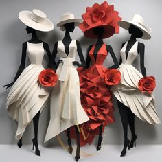 three mannequins with hats and dresses made out of paper