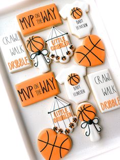 decorated cookies in the shape of basketballs with names on them and words that read, myp on the jayy