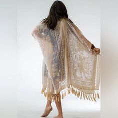 Dive Into The Luxurious Allure Of Our Velvet Mesh Tapestry Tassel Kimono, A Garment That Whispers Of Elegance And Mystery. Woven From A Sumptuous Blend Of 50% Nylon And 50% Viscose, This Kimono Invites Touch With Its Velvet-Like Feel. The Intricate Mesh Tapestry Pattern Is A Feast For The Eyes, While The Tassels Add That Perfect Dash Of Drama. With Dimensions Designed To Embrace Sizes 0-18, This Is A "One Size Fits Most" Piece That Truly Lives Up To Its Name. And Those Tassels? At 5 Inches Long, Resort Dress, Velvet Kimono, Velvet Burnout, Crochet Bralette, White Bralette, Elevated Style, Dance With You, Resort Dresses, Holiday Wear