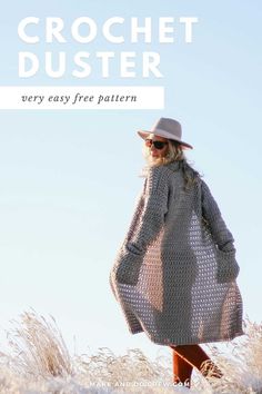 a woman in a hat and dress walking through tall grass with the text crochet duster