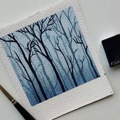 an inking technique is used to draw trees in the woods with watercolors