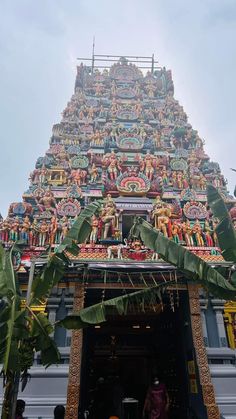 the entrance to an elaborately decorated hindu temple