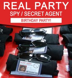 some sunglasses are sitting on a table with the words real party spy / secret agent birthday party