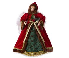 a doll dressed in red and green holding a christmas tree