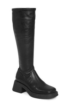 A full-length side zip traces the knee-high silhouette of this fierce leather boot finished with a square toe and chunky block heel. 2 1/4" heel 16" shaft Leather upper and lining/rubber sole Imported Edgy Knee-high Boots With Block Heel For Fall, Edgy Fall Knee-high Boots With Block Heel, Edgy Leather Knee-high Boots With Block Heel, Edgy Wide Calf Leather Knee-high Boots, Edgy Leather Knee-high Boots With Wide Calf, Knee High Black Boots, High Black Boots, Chunky Block Heels, Leather Boot