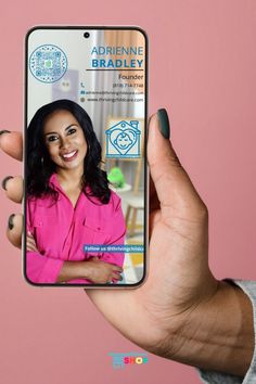 a person holding up a cell phone with an ad on the front and side of it