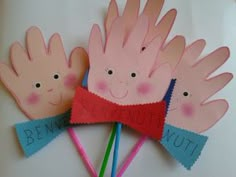 three hand puppets with words written on them