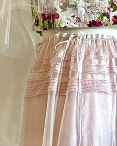 This beautifully crafted embroidered overskirt is a Limited Edition item. Only 1 available for Spring Delivery. This skirt is made of the softest mesh fabric with tie waist detail. Completely sheer and transparent fabric. Great as layering piece; One size fits up to 54" hip. This skirt features princess seams and drawstring ties on both sides of the waist. Handwash with cold water is recommended. Hang to Dry, Cool Iron. Skirt shown with Bralette in Blooming Meadow and Pin-tuck Underskirt with ru Feminine Ruffled Bottoms For Wedding, Feminine Tiered Skirt For Garden Party, Feminine Gathered Skirt For Garden Party, Feminine Tiered Maxi Skirt For Garden Party, Bohemian Tiered Tulle Skirt, Spring Wedding Bottoms With Ruffled Skirt, Spring Wedding Ruffled Skirt Bottoms, Flared Ruffled Skirt For Garden Party, Flared Ruffle Skirt For Garden Party