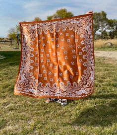 Add a touch of Western charm to your wardrobe with this stunning vintage-inspired wild rag, featuring an elegant paisley print. Crafted from luxurious satin, it feels soft and smooth against your skin. Measuring 35" x 35", this classic square scarf offers endless styling options--perfect as a cowgirl wild rag, neckerchief, or headscarf. The rich golden-brown hue is ideal for fall, bringing out your inner cowgirl while adding a bold statement to any outfit. Whether you're heading to the rodeo or elevating your everyday style, this scarf is the perfect Western accessory! Shop Razels for fun unique Western inspired clothing! Western Paisley, Western Scarf, Cowgirl Dresses, Western Accessories, Paisley Scarves, Wild Rag, Brown Fall, Hand Knit Hat, Fall Scarves