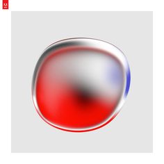 a red white and blue button on a gray background