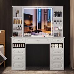 the vanity is white and has many bottles on it, along with a large mirror