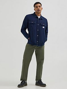 The Lee® Men's Relaxed Fit Denim Workwear Overshirt is the perfect blend of timeless style and tried—and-true durability. Crafted from 100% regenerative cotton, it offers a comfortable relaxed fit with practical snap button flap chest pockets and slash front pockets. This do- anything wardrobe addition was inspired by Lee’s historically good-looking American workwear, ideal for layering when it’s cold or staying cool and un-buttoned on warmer days. Work Casual Outfit Men, Thick Men Fashion, Mens Work Fashion, Trendy Workwear, Workwear Men, Project 2025, Denim Overshirt, Mens Business Casual, American Workwear