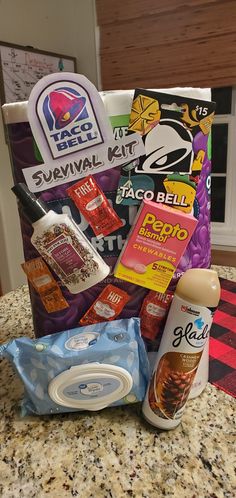 an assortment of snacks and condiments on a counter