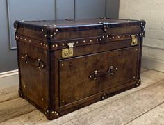 Handmade English leather draw trunk in a beautiful finish with brass fittings. Superb tv storage trunk or can be used as a large coffee table trunk with 1 large front draw and open up lid for extra storage. Superb interior design furniture piece. Built in a colonial style in any colour required usig traditional hand made leather craft skills. We can build this product to and size and colour to match your area. Made from the finest English vegetable tan leather with thick leather trim brass pinned and thick leather corners Tv Console Unit, Leather Console Table, Mini Lounge, Console Unit, Side Console, Custom Dresser, Trunk Chest, Large Coffee Table, Chest Furniture