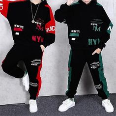 Season:Fall,Winter,Spring; Fabric:Cotton,Polyester; Sleeve Length:Long Sleeve; Look After Me:Machine wash; Gender:Boys; Quantity:2 Pieces; Style:Cool,Fashion; Occasion:Casual,Outdoor; Kids Apparel:Hoodie  Sweatpants Set; Age Group:Kids; Pattern:Graphic,Letter; Design:Pocket; Age:7-13 Years; Listing Date:10/12/2023 Winter Sets With Pockets And Long Sleeves, Winter Long Sleeve Sets With Pockets, Black Cotton Sets For Fall, Trendy Black Tracksuit For Fall, Trendy Winter Tracksuit With Pockets, Winter Streetwear Sets With Pockets, Trendy Black Sets For Winter, Sporty Streetwear Sets For Winter, Winter Cotton Tracksuit With Long Sleeves