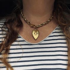 "Our Evil Eye Heart Necklace is just the thing your jewelry collection needs. Featuring a large heart this gold chunky necklace will make your outlook unforgettable. ★ Complete the look ★ Matching Bracelet Available to Purchase Here: https://yourockjewels.etsy.com/listing/1667852952/heart-charm-bracelet-chunky-gold-chain ---------------------------------------- M A T E R I A L S * 18K gold-plated stainless steel link chain 8mm. * Water-resistant, Tarnish resistant, Hypoallergenic * 24Κ gold-plated over copper heart pendant 25x39mm * Stainless steel clasp to secure perfectly.  * Different Chain lengths, from 16\" to 20\" inches long including the clasp. Choose the length from the dropdown menu.  * Chain will not come with an extension. ♥ YOUROCK JEWELS TIP ♥: Wear it alone or mix other chai Metal Heart Necklace With Chunky Chain, Chunky Heart Pendant Jewelry Gift, Gold Chunky Heart-shaped Jewelry, Chunky Heart-shaped Gold Jewelry, Chunky Heart Shaped Gold Jewelry, Chunky Metal Necklace With Heart Pendant, Chunky Metal Heart Pendant Necklace, Heart-shaped Gold Chain Necklace, Chunky Heart-shaped Gold Necklace