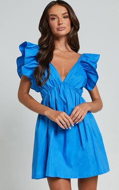 Raiza Mini Dress - Ruffle Sleeve Tie Back Plunge Dress in Blue Semi Formal Sorority Dresses, Blue Ruched V-neck Mini Dress, Light Blue V-neck Mini Dress With Ruffle Hem, Light Blue Ruffled V-neck Mini Dress, Light Blue V-neck Mini Dress With Ruffles, Blue V-neck Ruched Mini Dress, Blue Dress With Ruffled Straps For Date Night, Chic Blue Mini Dress With Ruffle Hem, Chic Blue Dress With Ruffled Straps