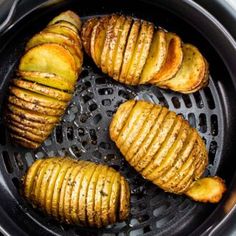 potatoes in an air fryer being cooked