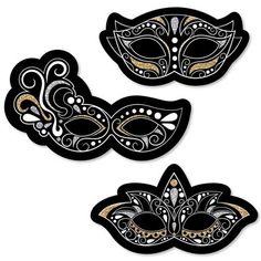 three black and gold masquerade masks