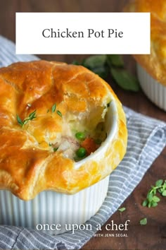 two chicken pot pies sitting on top of a table