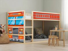 a child's bedroom with bunk beds and toys