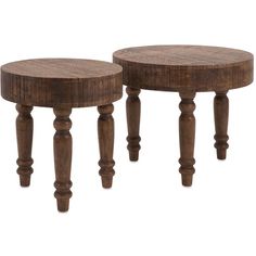 two wooden stools sitting next to each other