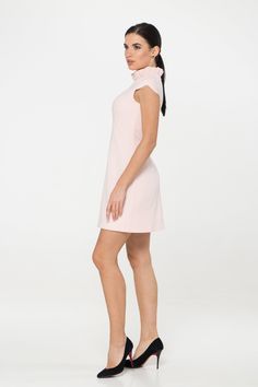 "A pale pink mini dress featuring a frill mock neck, cap sleeves, empire waist, viscose lining, concealed back zipper closure, and a trapeze silhouette. - empire waist - ruffled high neck - short cap sleeves - a line silhouette - concealed back zipper closure - above the knee length (mini) - fully lined Color: pale pink Fiber: 40% viscose, 55% polyester, 5% elastane Lining - 95% viscose, 5 % elastane. For size S: length- 34,5\" (88 cm) Our model wears size S (US 6) and is 171cm/5'6\" tall. You m Chic Cap Sleeve Mini Dress For Spring, Feminine A-line Mini Dress, Fitted Short Sleeve Mini Dress With Ruffles, Feminine Solid Mini Dress, Summer Stretch Mini Dress With Cap Sleeves, Formal High Neck Mini Dress For Summer, Spring High Neck Mini Dress For Formal Occasions, Spring Formal High Neck Mini Dress, Feminine Stretch Knee-length Dresses