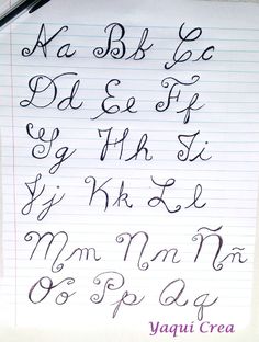 some handwriting written on top of a piece of paper with the letters in cursive writing