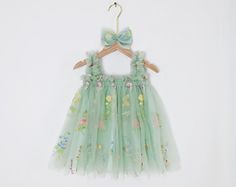 🌻 Welcome to I Love Family Store! We specialize in handcrafted children's dresses, offering a wide variety of styles, materials, and colors. Our attention to detail and quality craftsmanship are second to none. Every dress is made with care, and we can customize them to your specifications. Explore our collection and find the perfect dress for your little one! 🌻 Dress Details: Length: Knee, Mid-calf Colors: Green, Pink, White, Lavender, Dusty Pink, Red, Pink Material: Tulle, Lace 👗 Perfect fo Summer Princess Style Fairy Dress, Summer Fairytale Fairy Dress For Dress-up, Fairy Style Dress-up Dresses For Summer, Sleeveless Fairytale Fairy Dress For Summer, Summer Fairytale Dress-up Dresses, Whimsical Tulle Tutu Dress For Garden Party, Spring Princess Style Fairy Dress, Spring Fairytale Fairy Dress For Dress-up, Spring Princess Dress With Floral Applique For Fancy Dress