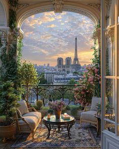 an open balcony with chairs and tables overlooking the eiffel tower