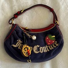 Juicy Couture Vintage Strawberry Fields Blue Terrycloth Shoulder Bag Stunning Vintage Bag In Euc. Please See All Photos. Measures Approximately 12.5” L X 14.5” H, Including Strap. Such A Beautiful Piece Friendly Seller, Fast Shipping, Smoke Free & Pet Free Home Y2k Juicy Couture Bag, Cute Y2k Bags, Luxury Blue Bag With Embroidered Logo, Luxury Blue Bags With Embroidered Logo, Stylish Purses And Handbags, Juicy Couture Bags Vintage, Vintage Juicy Couture Bags, Name Brand Purses, Juicy Couture Daydreamer Bag