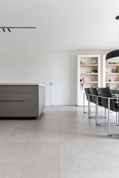 the kitchen is clean and ready to be used for dinner or breakfast time, as well as dining room furniture