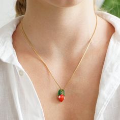 Add a splash of color and fun to your day with our Murano Glass Strawberry Necklace. Part of our bijoux collection, this funky and vibrant accessory brings sunshine and joy to any outfit. Handmade in Germany, the necklace features a charming Murano glass strawberry pendant paired with delicate freshwater pearls on a recycled, gold-plated stainless steel chain. Each piece is unique, showcasing artisanal craftsmanship. Measuring 45 cm, it's perfect for everyday wear or special occasions. Arrives b Funky Necklaces, Strawberry Necklace, Jewelry Magazine, September Birthstone Jewelry, Box Making, Zodiac Jewelry, Funky Jewelry, Jewelry Ring Box, Pearl Jewellery Earrings