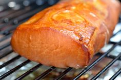 a piece of meat sitting on top of a grill