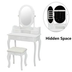 a white vanity table with mirror and stool next to it's own storage compartment