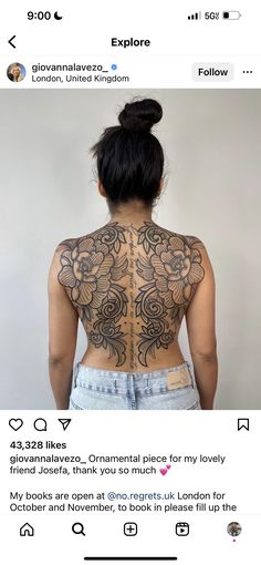 the back of a woman's body with tattoos on her upper and lower half