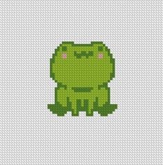 a cross stitch pattern with a green frog on it's chest and eyes closed