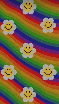 a rainbow colored background with smiley faces and clouds in the middle, all on top of each other