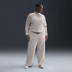 Grounded in style, comfort and versatility, meet our take on luxury loungewear. Textured fleece makes these high-waisted pants cozy enough to wear around the house yet elevated enough to wear out in the city. Meanwhile, extra room throughout the legs lets you relax to the max. Nike Sweatpants For Loungewear In Fall, Nike Sweatpants With Elastic Waistband For Loungewear, Nike Sweatpants For Fall Loungewear, Nike Athleisure Pants For Loungewear, Nike Sweatpants For Winter Loungewear, Nike Pants With Elastic Waistband For Loungewear, Beige Athleisure Bottoms For Loungewear, Beige Loungewear Pants With Ribbed Cuffs, Beige Sweatpants For Loungewear In Fall