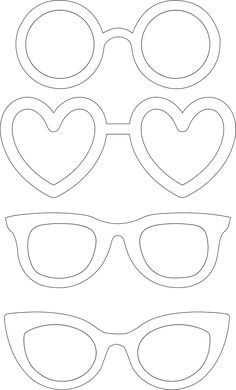 paper cut out of sunglasses with hearts on the side and one heart in the middle