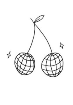 two cherries hanging from a wire on top of each other with stars around them