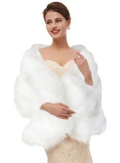 a woman wearing a white fur stole