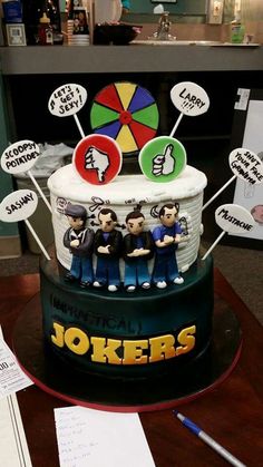 there is a cake that has been decorated with people on it and the name jokers