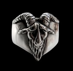 Taking inspiration from Eliphas Levi's Baphomet . It's 100% Sterling Silver carved ring (unisex) Height: 21.5 mm Width: 23 mm (Depending on size) Approx Weight: 17 grams (Depending on size) The ugly beast's head expresses the horror of the sinner, whose materially acting, solely responsible part has to bear the punishment exclusively; because the soul is insensitive according to its nature and can only suffer when it materializes. You can choose 2 types of finishes: shiny or brushed ALL SIZES AV Sterling Silver Skull Rings, Silver Skull Ring, Carved Ring, Feb 7, Skull Ring, Ring Sterling Silver, Sterling Ring, Solid 925 Sterling Silver, Small Businesses