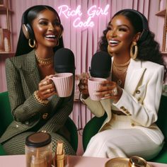 two women sitting at a table holding coffee mugs and talking on the phone, with pink neon sign behind them