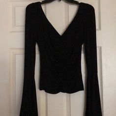 Free People. Black. Bell Sleeve Top. Never Worn! Black V-neck Top For Night Out, Black Fitted Blouse For Going Out, Fitted Black Blouse For Going Out, Fitted Casual Tops For Going Out, Trendy Black Stretch Blouse, Black Long Sleeve Tops For Going Out, Edgy Black Stretch Blouse, Edgy Stretch Tops For Going Out, Black Fitted Top For Night Out